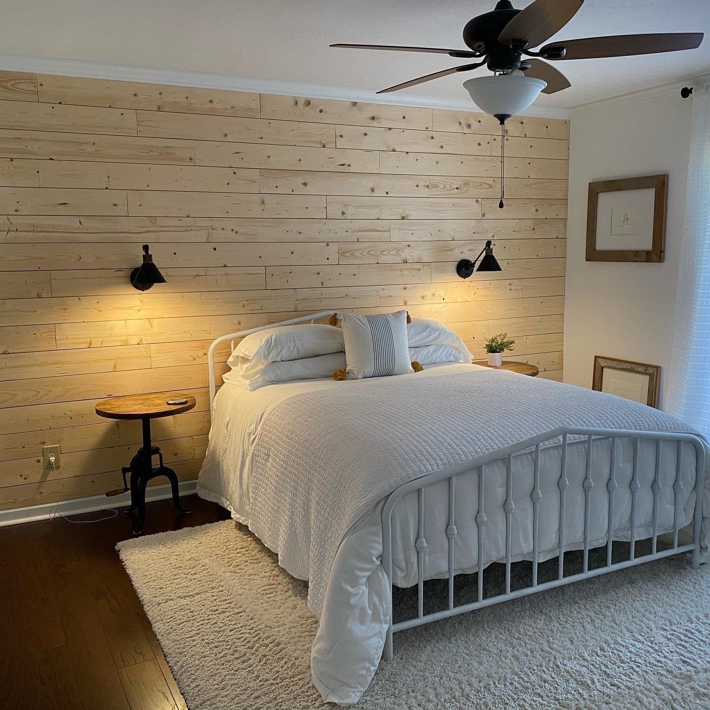 Bedroom with a beautiful wood slat feature wall