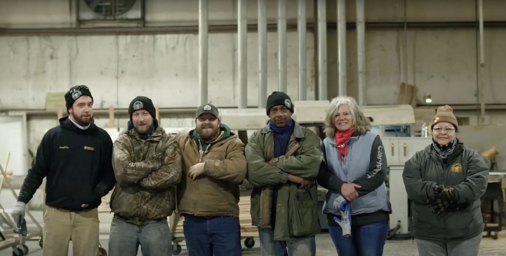 Group of Lumber & Supply Employees posing for the camera
